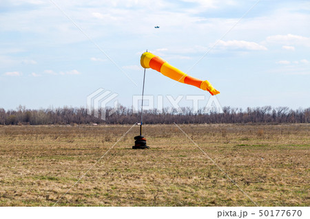 Horizontally flying windsock wind vane with red 50177670