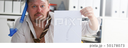 Man wearing suit and tie in goggles and snorkel Man wearing suit and tie in goggles and snorkel 50178073