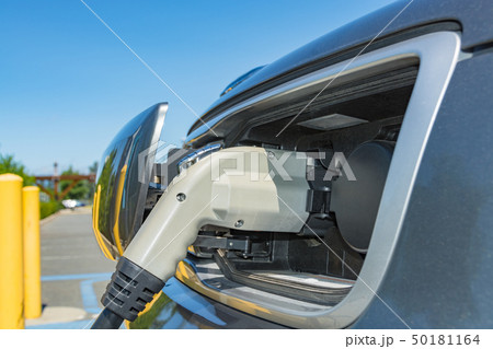 Electric plug connected to EV for energy fulfil from charging station 50181164