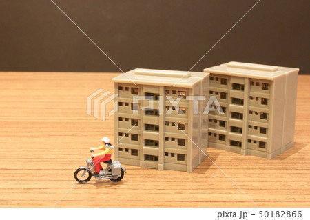 fun of figure motor bike on the road riding 50182866
