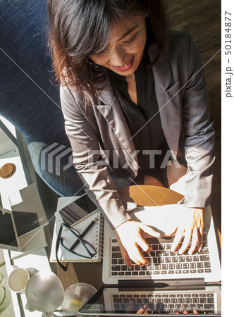 Businesswoman working on computer in the office Businesswoman working on computer in the office 50184877