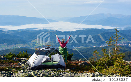 Camping on the top of mountain on bright summer morning Camping on the top of mountain on bright summer morning 50188087