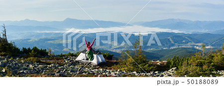 Camping on the top of mountain on bright summer morning Camping on the top of mountain on bright summer morning 50188089