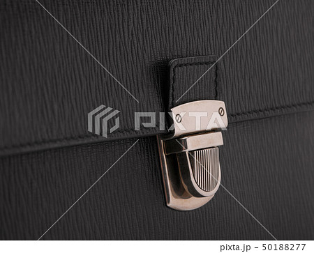 the clasp on the black bag 50188277
