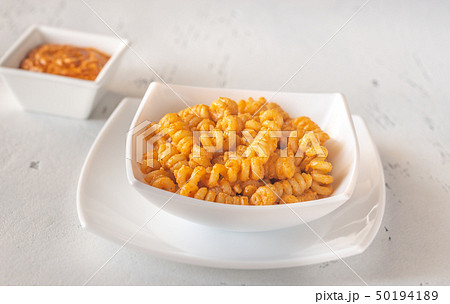 Portion of pasta with tomato and ricotta pesto 50194189