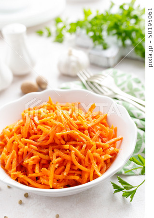 Salad with fresh raw carrot, Korean carrot salad Salad with fresh raw carrot, Korean carrot salad 50195061