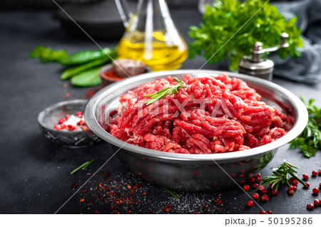 Mince. Ground meat with ingredients for cooking 50195286