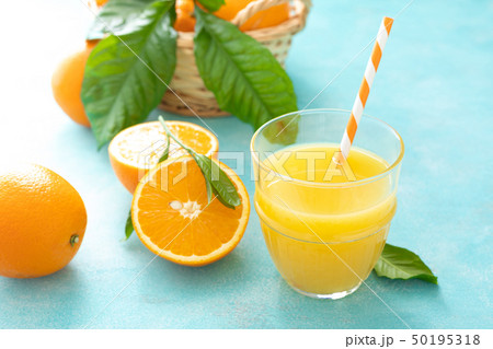 Orange freshly squeezed juice in glass and fresh Orange freshly squeezed juice in glass and fresh 50195318