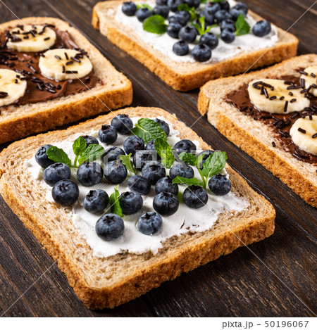 Delicious open sandwich with chocolate and banana 50196067