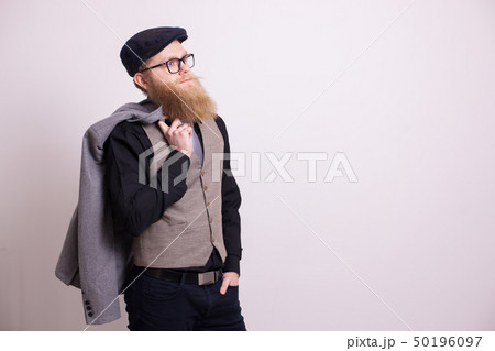 Portrait of successful bearded businessman in suit over white background Portrait of successful bearded businessman in suit over white background 50196097