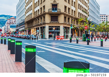 Modern traffic lights posts on pedestrian crossing 50197159