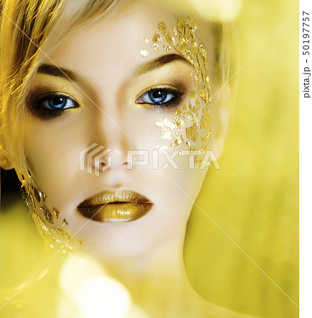 beauty blond woman with gold creative make up beauty blond woman with gold creative make up 50197757