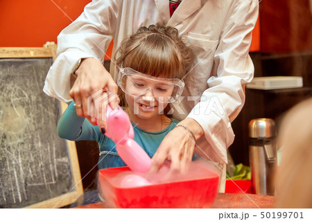 Chemical show for kids. Professor carried out chemical experiments with liquid nitrogen on Birthday Chemical show for kids. Professor carried out chemical experiments with liquid nitrogen on Birthday 50199701