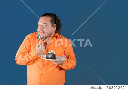 Funny fat man in orange shirt Funny fat man in orange shirt 50201262