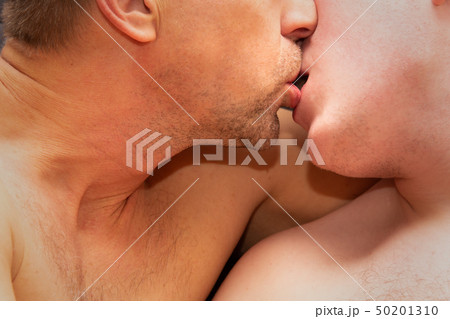 Two guys are kissing. Love and relationships Two guys are kissing. Love and relationships 50201310