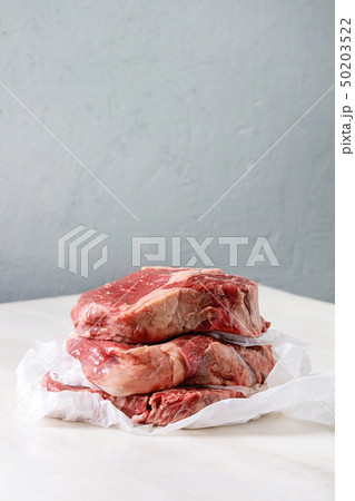 Raw beef steaks 50203522