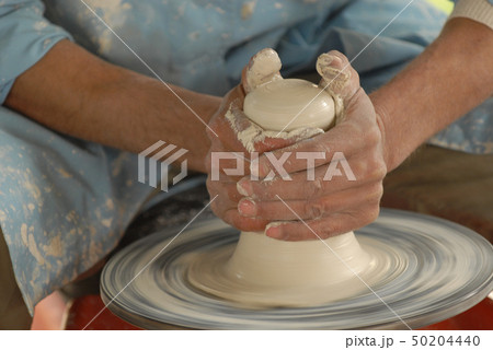 Potter's skillful hands 50204440