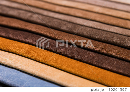 Close-up diagonal lines of textile upholstery in samples to select the color and fabric of the Close-up diagonal lines of textile upholstery in samples to select the color and fabric of the 50204597