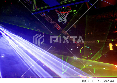 basketball hoop and sports arena in laser lights 50206508