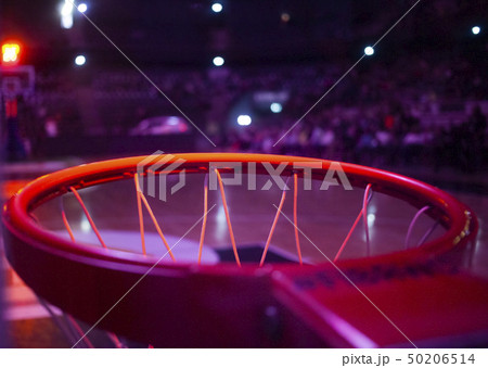 basketball hoop in red neon lights in sports arena 50206514