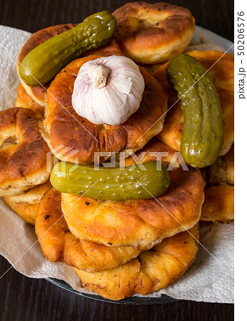 Belyashi, Tomatoes, Pickled cucumbers, Garlic, Vodka glass 50206576