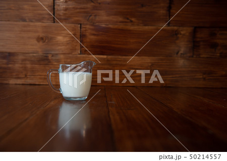 milk in glass milk jug 50214557