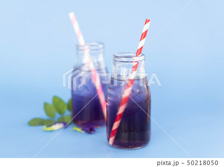 Butterfly pea juce in grass bottle with leaf 50218050