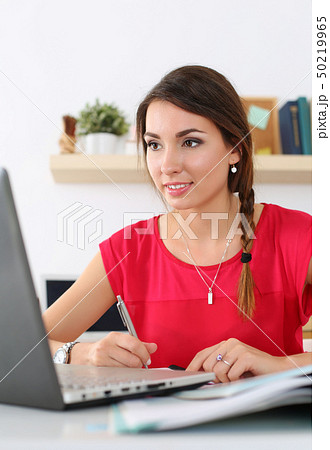 Beautiful smiling female student Beautiful smiling female student 50219965