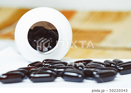 pills scattered on the table pills scattered on the table 50220343