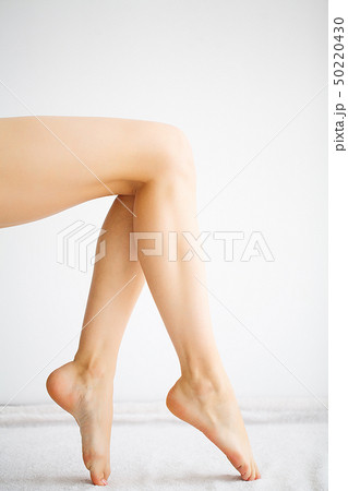 Beautiful Soft Skin. Closeup Of Long Woman Legs With Perfect Hairless Smooth And Silky Skin. Hair 50220430