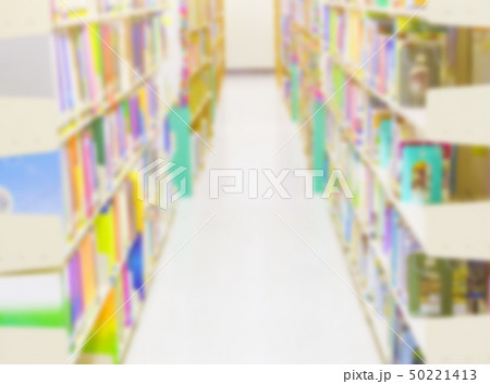 blurry library bookshelves background. in school blurry library bookshelves background. in school 50221413