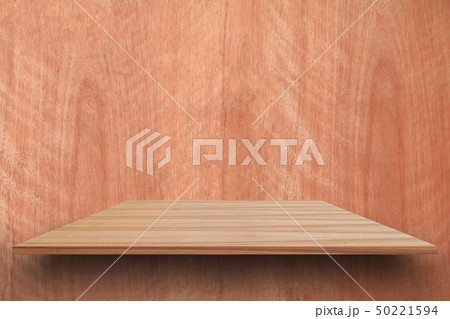 Empty top wooden shelves and woody wall Empty top wooden shelves and woody wall 50221594