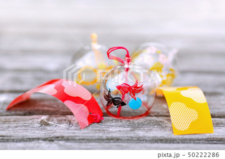 Japanese wind chimes on wooden background 50222286