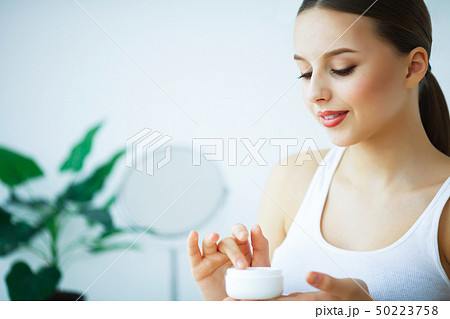 Beauty and Care. Portrait of a Young Girl with Pure Skin. Beauti Beauty and Care. Portrait of a Young Girl with Pure Skin. Beauti 50223758