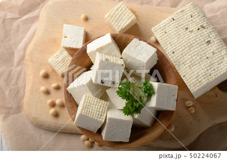 Flat lay view at Soy Bean curd tofu in wooden bowl Flat lay view at Soy Bean curd tofu in wooden bowl 50224067