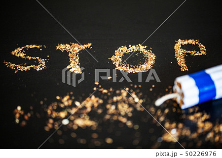 Stop smoking concept on background with broken cigarettes. Heap of cigarettes. No smoking Stop smoking concept on background with broken cigarettes. Heap of cigarettes. No smoking 50226976