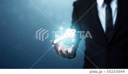 Businessman hand showing key to success Businessman hand showing key to success 50233044