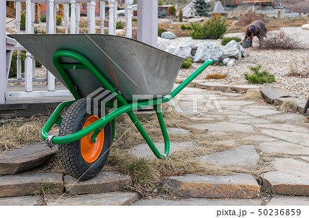 A hand cart with a wheel for garbage collection 50236859