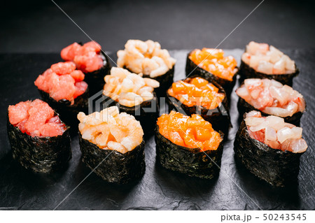Sushi set gunkan maki with salmon, tuna and prawn 50243545