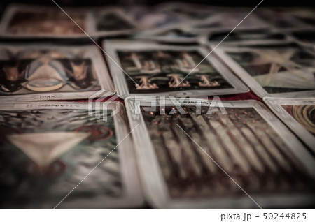Closeup of occult mystic tarot deck and old tarot 50244825