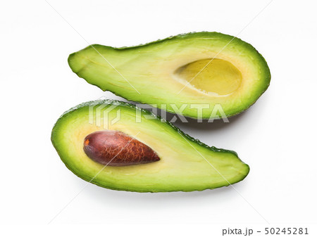 Two halves of ripe avocado 50245281