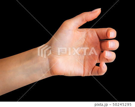 Woman hand holding something like a bottle or glass 50245295