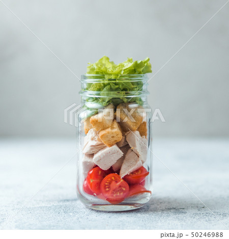 Caesar salad in glass mason jar, copy space 50246988