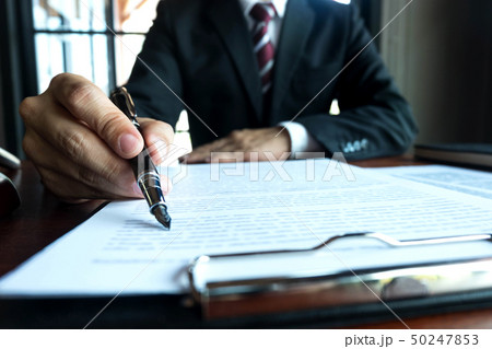 Lawyer working on the table in office. Lawyer working on the table in office. 50247853