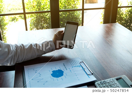 Businessman using smartphone to the situation. Businessman using smartphone to the situation. 50247854
