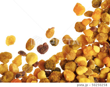 Closeup view of bee pollen isolated on white background Closeup view of bee pollen isolated on white background 50250258