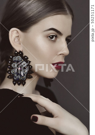 Portrait of young beauty dark hair girl in vintage 50251171