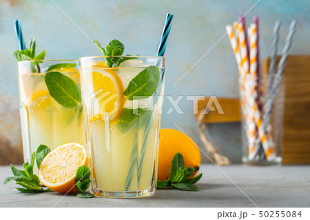 Two glass with lemonade or mojito cocktail. Two glass with lemonade or mojito cocktail. 50255084
