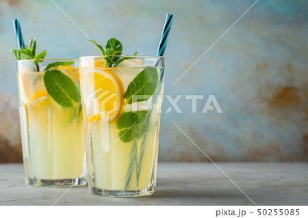 Two glass with lemonade or mojito cocktail. Two glass with lemonade or mojito cocktail. 50255085