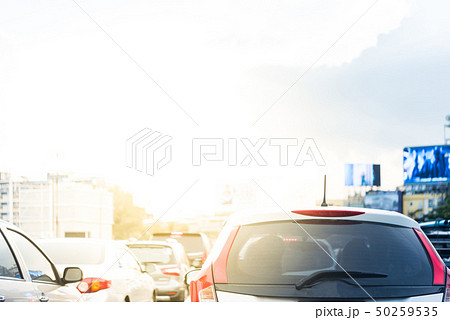 Cars on busy road in the city with traffic jam Cars on busy road in the city with traffic jam 50259535